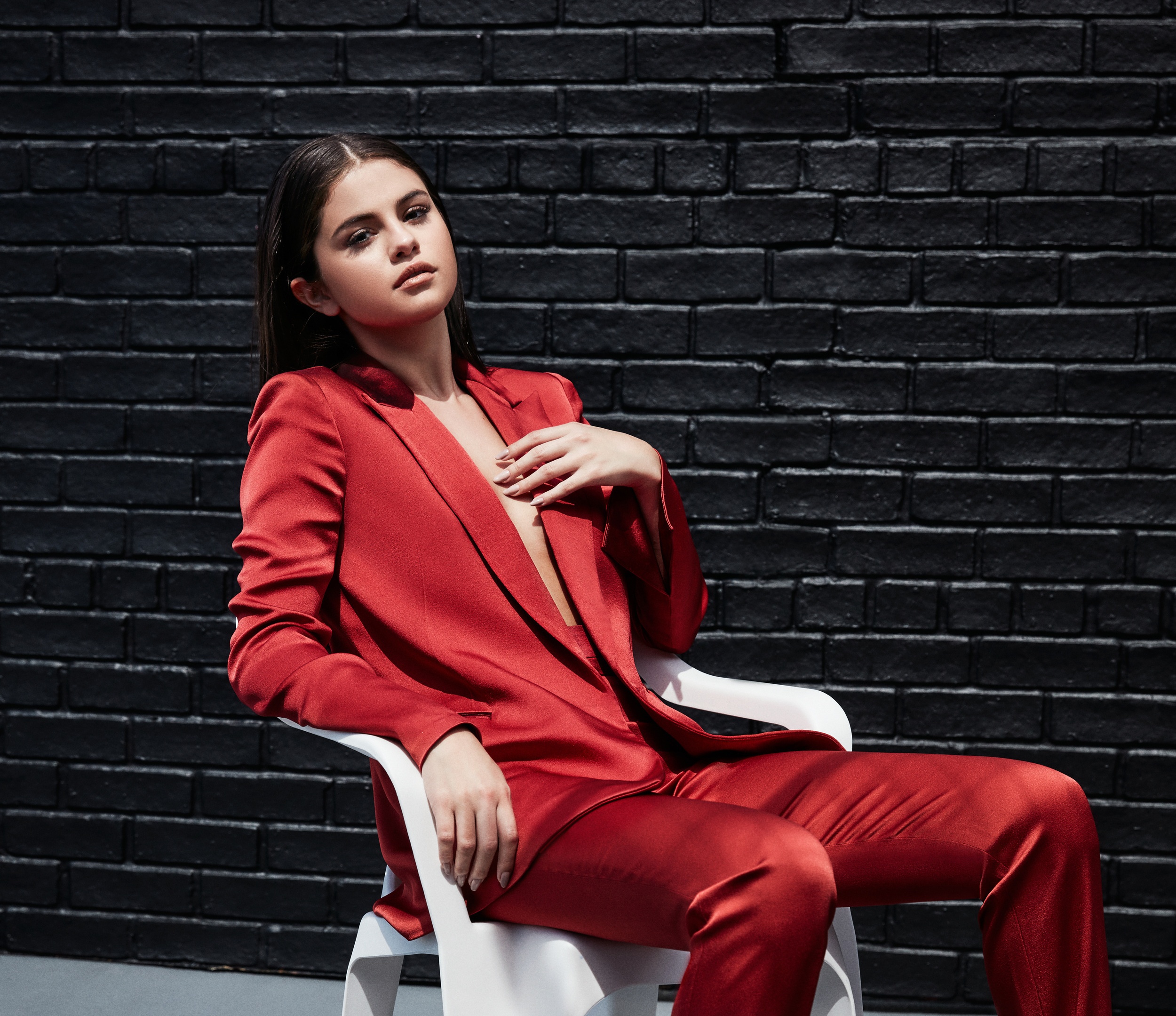 Wallpaper sitting, celebrity, Selena Gomez, red suit for mobile