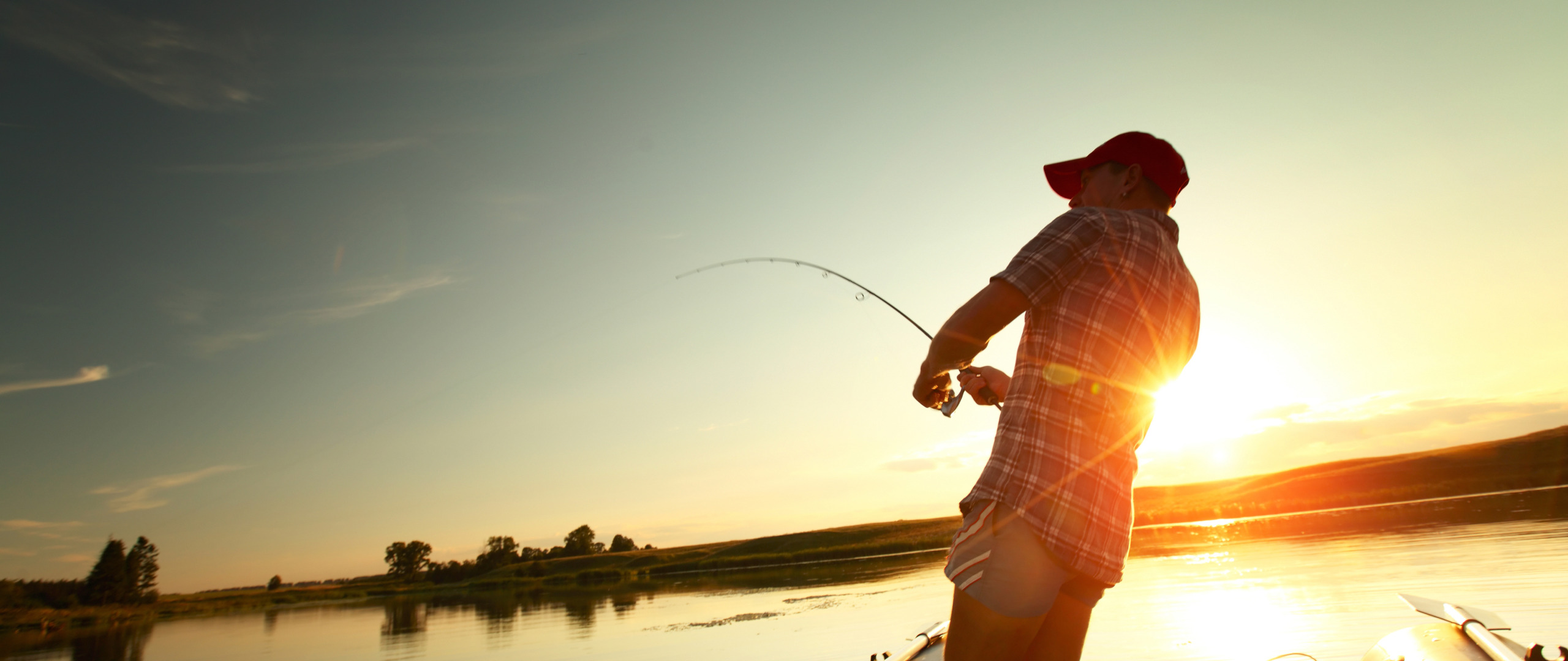 National fishing. Рыбак в лодке. Фон рыбалка. Рыбак со спиннингом. Фон для рыбака.