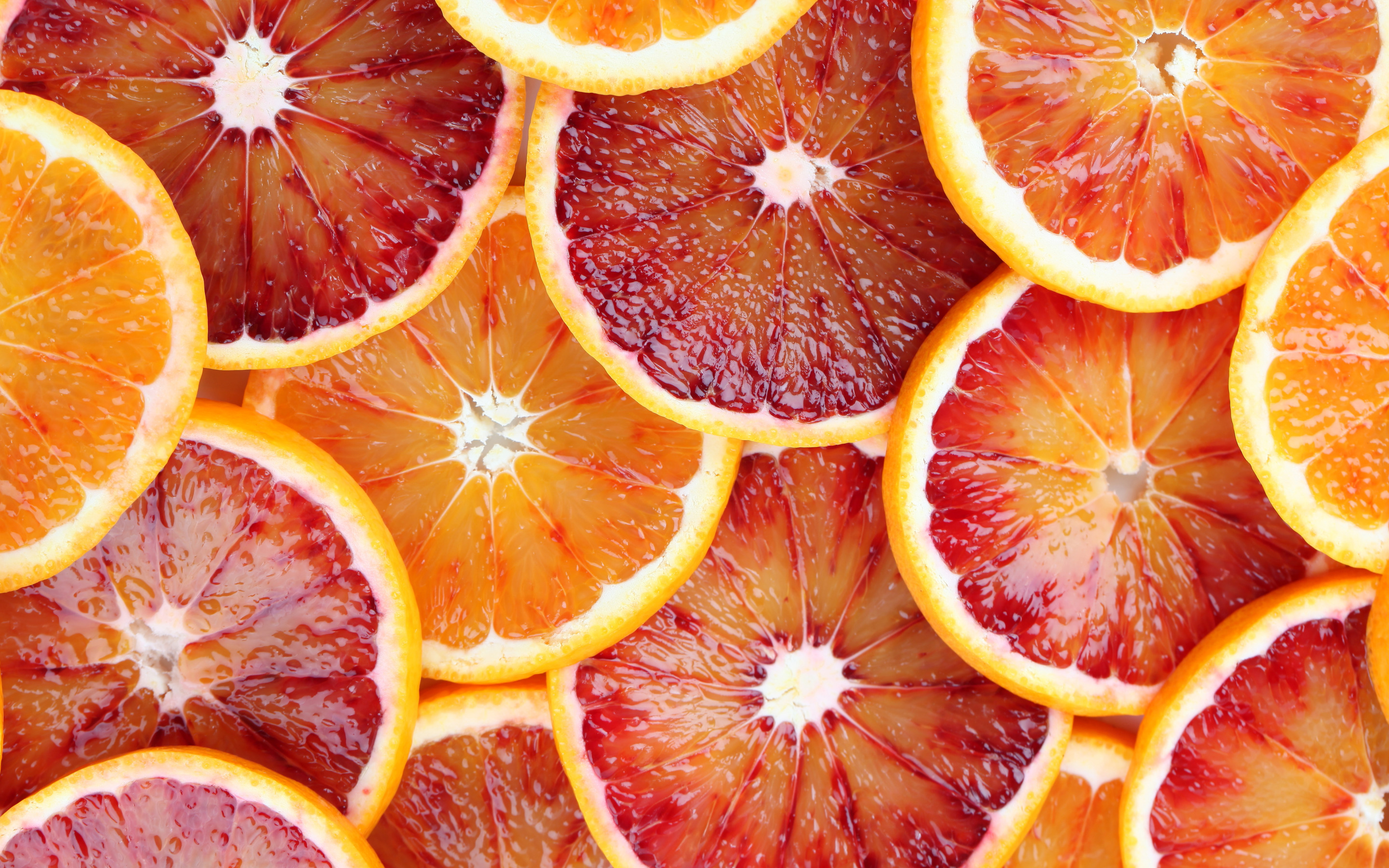 Фруктовые дольки. Цитрус апельсин грейпфрут. Сочные фрукты. Сочный апельсин. Апельсины фон.