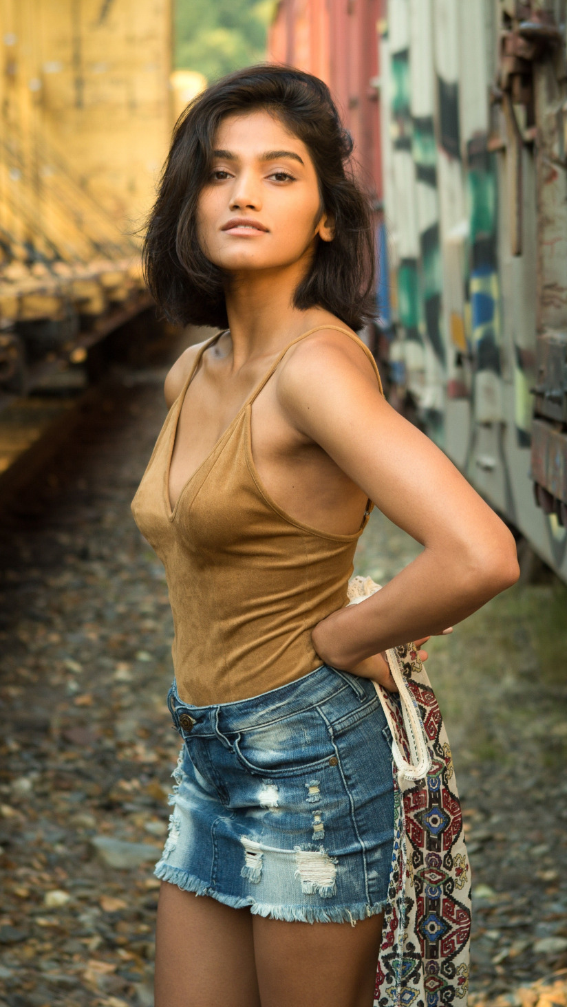 Download wallpaper graffiti, beautiful, model, train, brunette, Angel  Constance, jeans mini skirt, section girls in resolution 824x1464