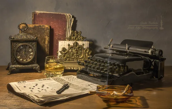 Picture glass, watch, handle, newspaper, book, typewriter, crosswords, butts