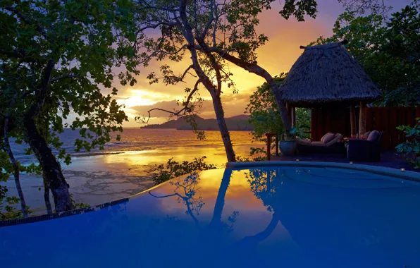 Picture the ocean, the evening, pool, the hotel