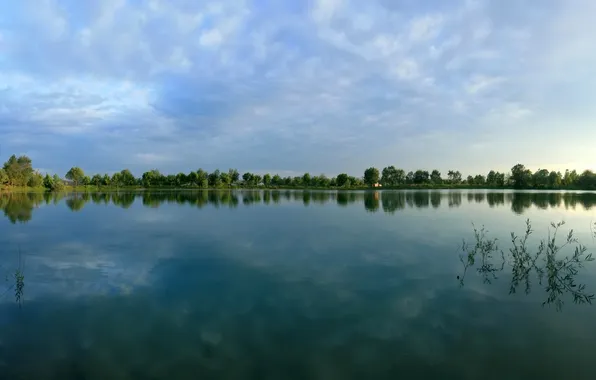 The sky, clouds, lake, surface, reflection