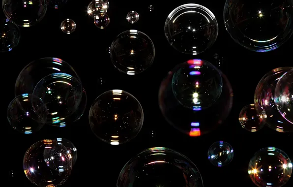 Picture reflection, bubbles, black background