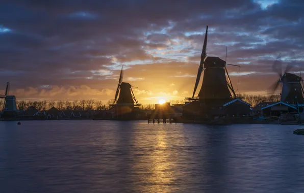 The sky, clouds, sunset, shore, pond, windmills, windmill