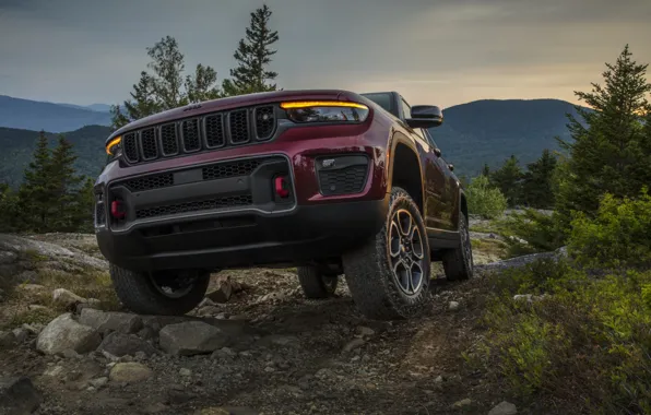 The sky, trees, SUV, sky, trees, boulders, suv, exterior