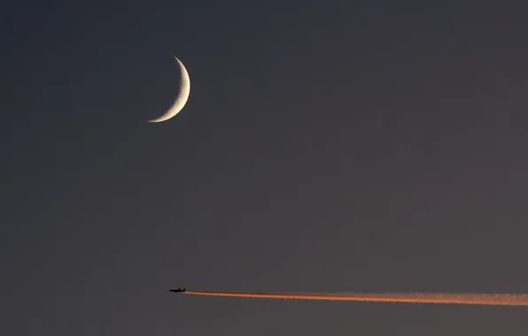 The sky, the moon, the plane