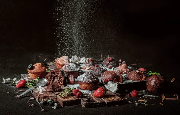 Berries, cakes, cupcakes, powdered sugar
