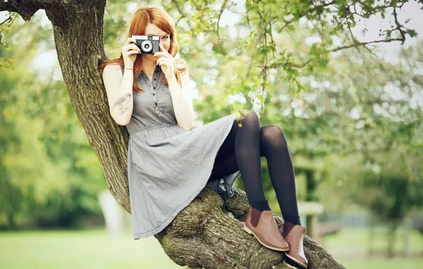 Girl, tree, cameras