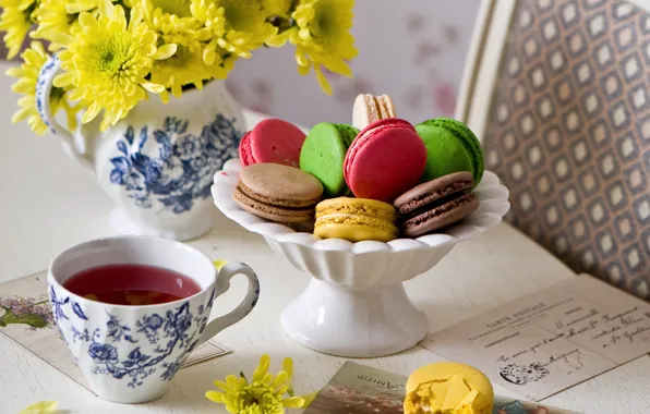 Flowers, tea, letters, macaroon