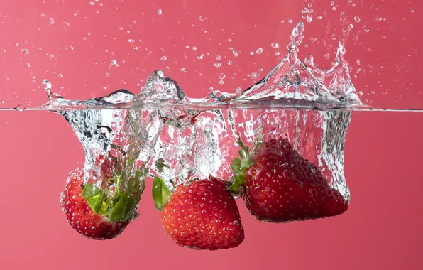 Water, squirt, bubbles, berries, splash, strawberry, red background, in the water