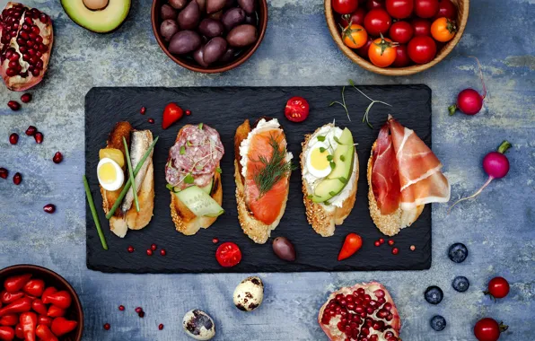 Berries, egg, fish, dill, sausage, garnet, avocado, cherry