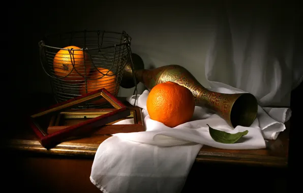 The dark background, table, oranges, fabric, vase, pitcher, fruit, still life
