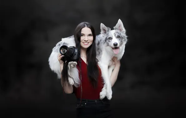 Girl, dog, the camera