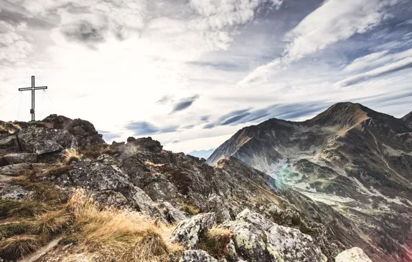 The sky, mountains, cross