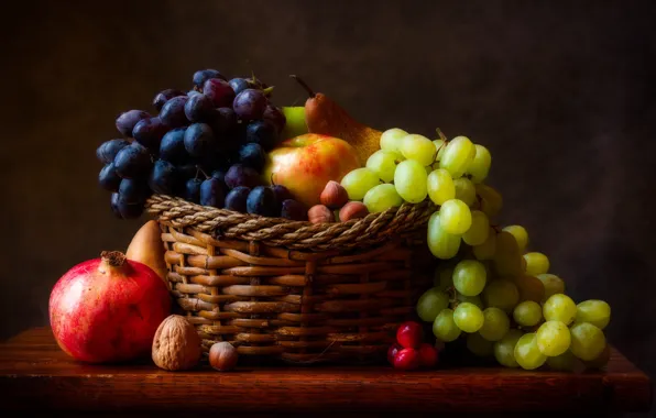 The dark background, table, apples, grapes, fruit, nuts, still life, basket