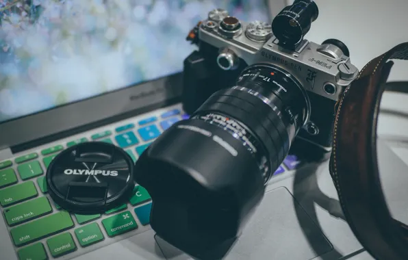 The camera, lens, keyboard, Olympus