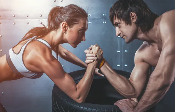 Picture woman, man, concentration, arm wrestling, physical state