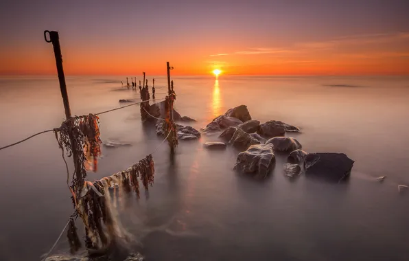 Sea, sunset, stones