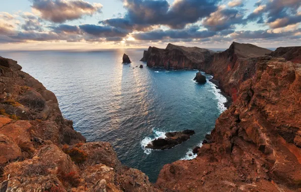 Sea, the sun, clouds, light, mountains, rocks