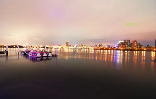 The city, lights, boats, pier, twilight
