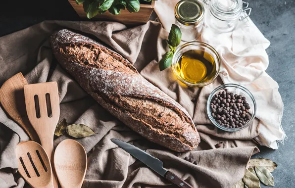 Oil, bread, knife, cakes, spices