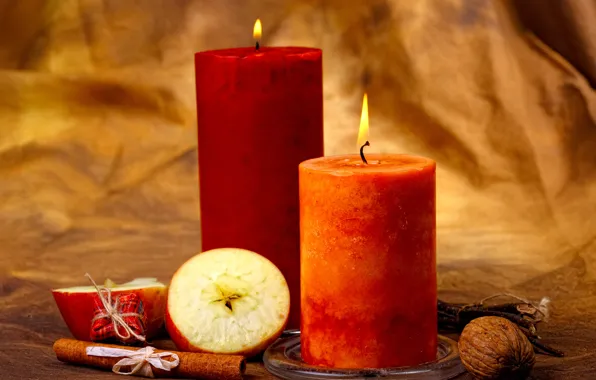 Picture apples, candles, nuts, cinnamon