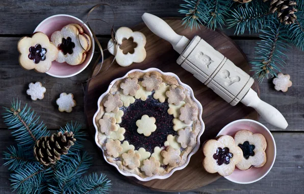 Picture cookies, pie, bumps, rolling pin, spruce branches