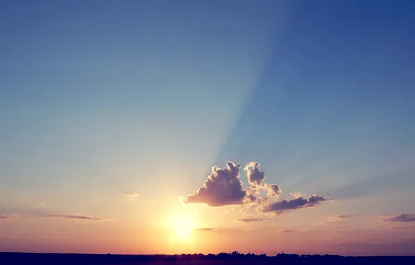 The sun, sunset, horizon, the sky. clouds