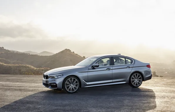 Picture the sky, light, mountains, grey, shadow, BMW, sedan, Playground