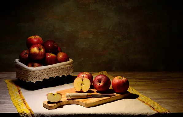 Light, the dark background, table, apples, towel, knife, fruit, still life