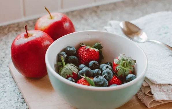 Berries, apples, blueberries, strawberry, spoon, bowl