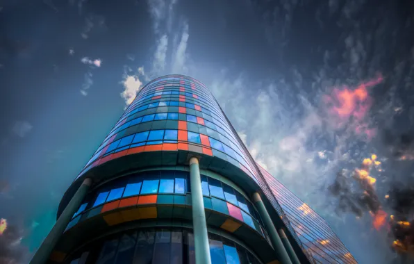 The sky, glass, clouds, the city, reflection, the building, color