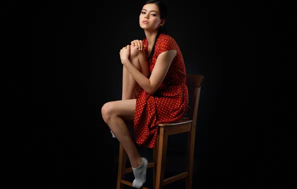 Picture look, girl, pose, polka dot, chair, legs, red dress, the dark background