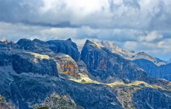 The sky, mountains, clouds, rocks