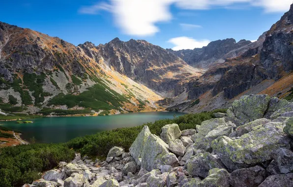 The sky, mountains, lake, blue, stones, rocks, shore, the slopes