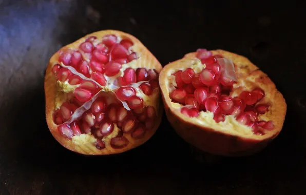 The dark background, fruit, grenades, pomegranate grains