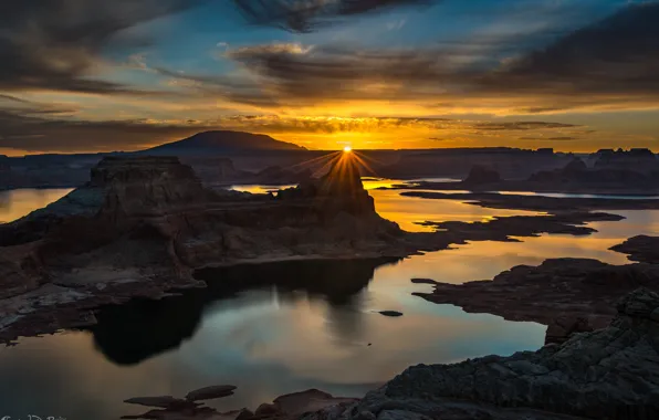Picture the sky, the sun, clouds, river, canyon