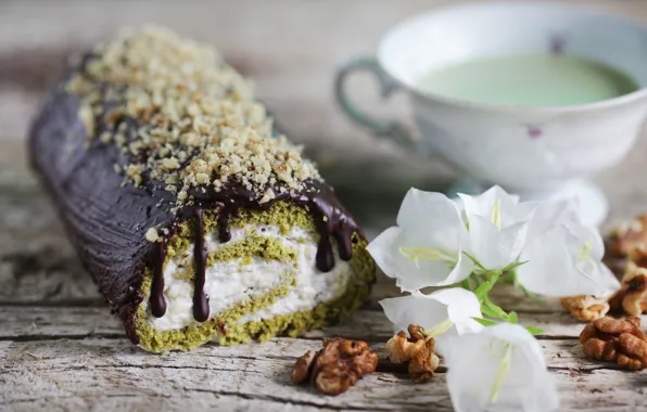 Tea, nuts, cream, cakes, roll