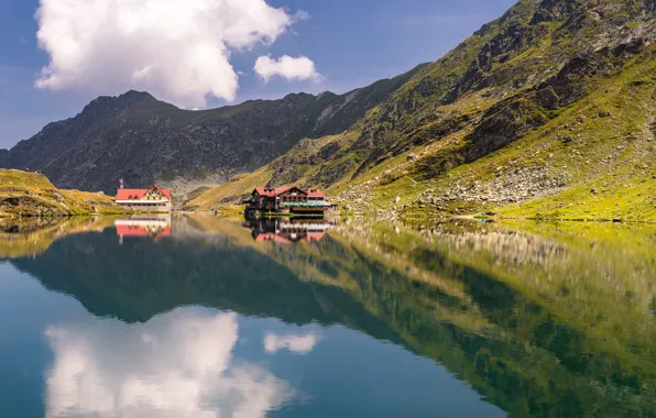 The sky, water, the sun, clouds, mountains, lake, reflection, stones