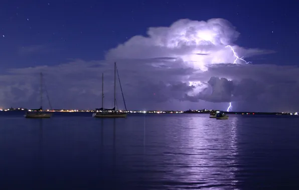 The sky, clouds, night, lights, lake, boat, yacht
