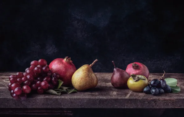 Grapes, pear, garnet, persimmon