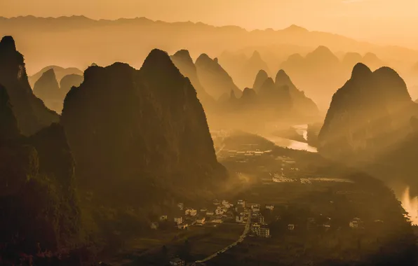 The sun, rays, light, mountains, fog, river, rocks, tops