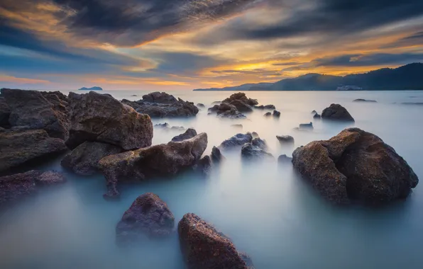 Picture sea, the sky, clouds, stones, rocks, the evening