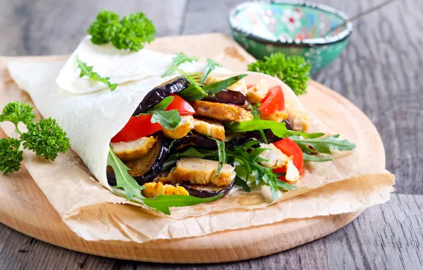 Meat, vegetables, sauce, pita