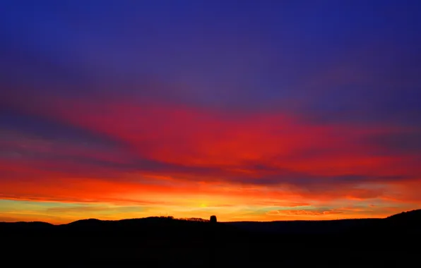 The sky, clouds, trees, sunset, hills, glow