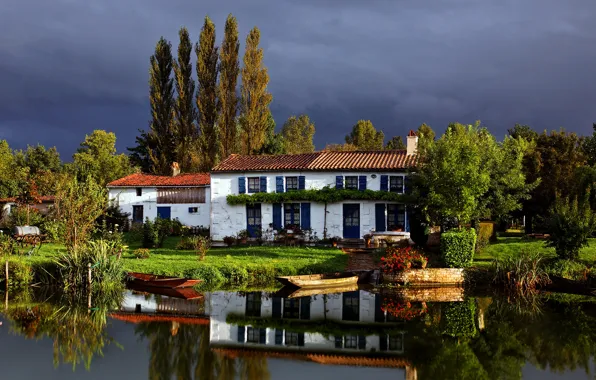 House, reflection, boats, dark sky