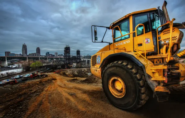 Sand, the sky, clouds, machine, bridge, the city, the descent, Volvo