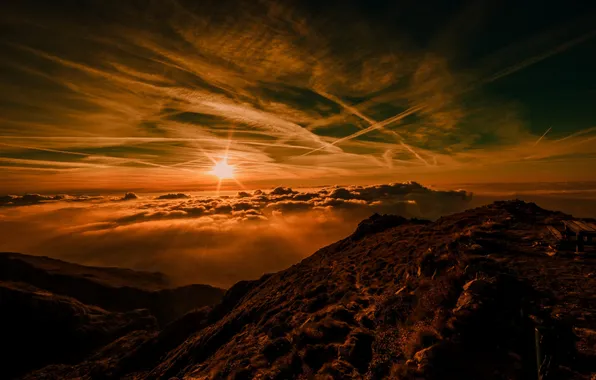 The sky, the sun, clouds, rays, sunset, mountains, fog, stones