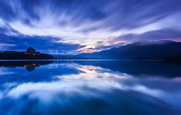 The sky, water, sunset, mountains, clouds, lake, surface, reflection